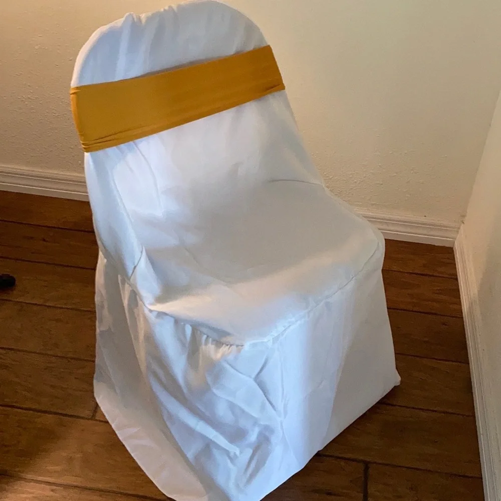 Chair Covers & gold chair bows New Year’s Eve, wedding, graduation, decor